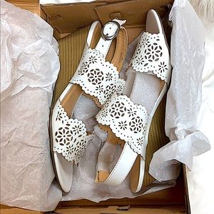 Brand new now wedged heels.